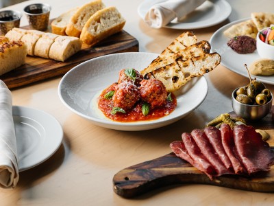 Enjoy the celebrity chef's unique twist on an American bar and grill, with global-inspired cuisine
